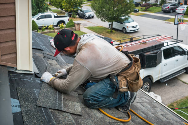 Professional Emergency Roof Repair technician working in Bergenfield, NJ